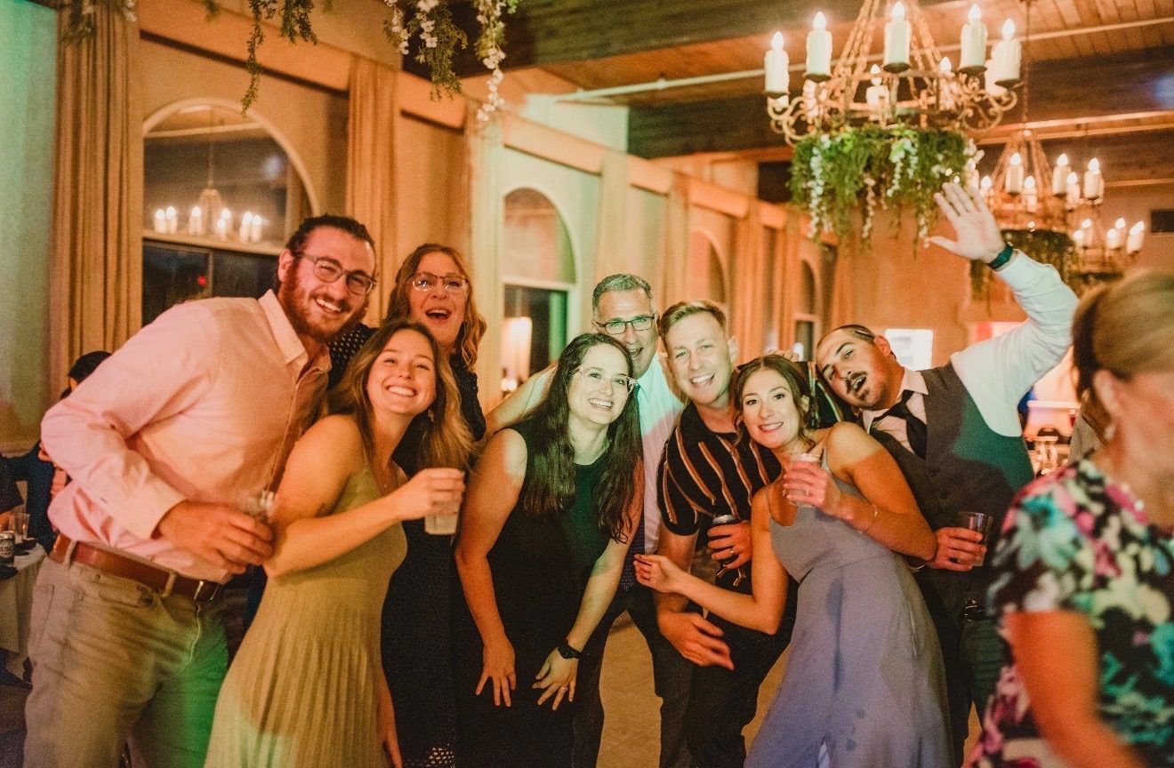 Guests posing together at the reception